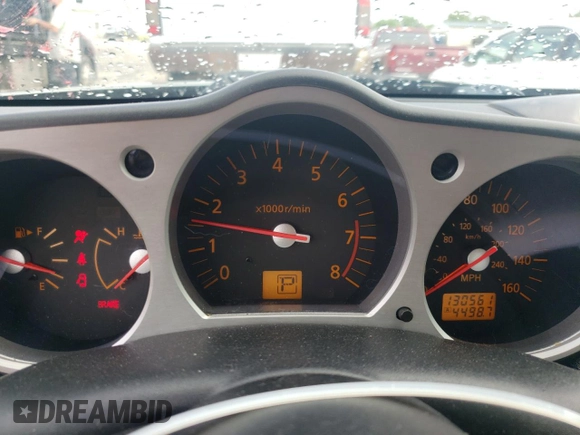 2004 Nissan 350Z Touring with VIN JN1AZ34D24M103656, listed as a Copart auction lot 55100955 with 130,561 mi miles and Salvage title. Bid and sale history available at DreamBid. Image 9.