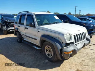 2004 Jeep Liberty Sport with VIN 1J4GK48K44W267418, listed as a IAAI auction lot 41591036 with 181,453 mi miles and . Bid and sale history available at carsss.com. Image 1.