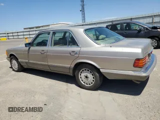 1990 Mercedes-Benz 300 with VIN WDBCA24D1LA529716, listed as a Copart auction lot 56581335 with 122,286 mi miles and Salvage Title. Bid and sale history available at DreamBid. Image 2.