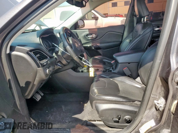 2019 Jeep Cherokee Altitude with VIN 1C4PJLLB8KD448427, listed as a Copart auction lot 58101445 with 173,007 mi miles and Salvage title. Bid and sale history available at DreamBid. Image 7.