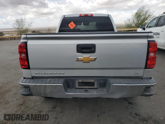 2018 Chevrolet Silverado 1500 LT with VIN 1GCVKREC2JZ180747, listed as a Copart auction lot 50405905 with 131,772 mi miles and Salvage Title. Bid and sale history available at DreamBid. Image 6.