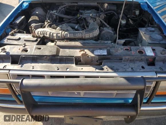 1991 Ford Ranger with VIN 1FTCR15T2MTA45652, listed as a Copart auction lot 76089874 with 90,947 mi miles and Salvage Title. Bid and sale history available at DreamBid. Image 13.