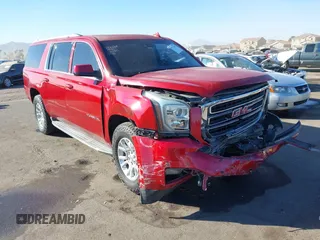 2015 GMC Yukon XL SLT with VIN 1GKS2HKC0FR585406, listed as a IAAI auction lot 41412441 with 210,321 mi miles. Bid and sale history available at carsss.com. Image 1.