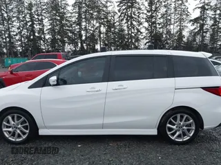 2015 Mazda Mazda5 Grand Touring with VIN JM1CW2DL6F0185594, listed as a IAAI auction lot 41470568 with 116,309 mi miles. Bid and sale history available at carsss.com. Image 14.