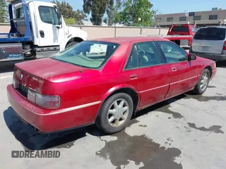 1996 Cadillac Seville Touring STS with VIN 1G6KY5290TU835414, listed as a IAAI auction lot 42051767 with 185,798 mi miles. Bid and sale history available at carsss.com. Image 4.