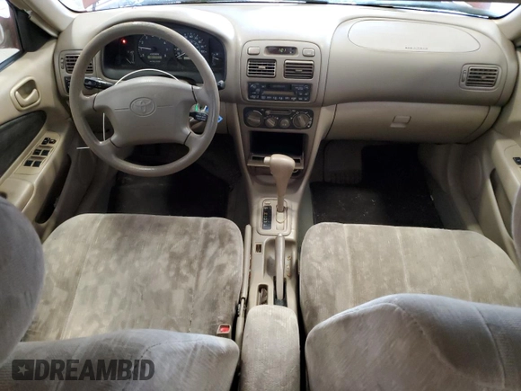 1999 Toyota Corolla VE z VIN 1NXBR12E4XZ286950, wystawiony jako Copart lot #58784525 z przebiegiem 195 720 mil mil oraz Nie do naprawy • Non repairable. Historia ofert i sprzedaży dostępna na DreamBid. Obrazek 8.