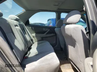 1999 Toyota Camry LE z VIN JT2BF22K4X0202019, wystawiony jako Copart lot #56104335 z przebiegiem 192 643 mil mil oraz Tytuł czysty. Historia ofert i sprzedaży dostępna na DreamBid. Obrazek 10.