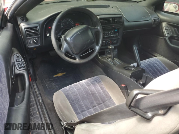 2002 Chevrolet Camaro z VIN 2G1FP22K022159501, wystawiony jako Copart lot #53638655 z przebiegiem 188 233 mil mil oraz Szkoda całkowita • Salvage title. Historia ofert i sprzedaży dostępna na DreamBid. Obrazek 8.