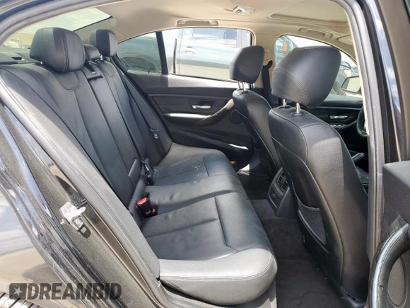 2013 BMW 3 Series 328i with VIN WBA3A5G55DNP21848, listed as a Copart auction lot 61733995 with 134,760 mi miles and Salvage title. Bid and sale history available at DreamBid. Image 10.