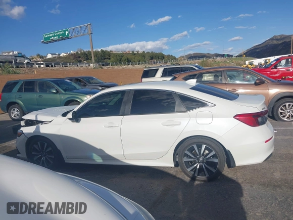 2023 Honda Civic EX z VIN 2HGFE1F78PH314024, wystawiony jako IAAI lot #41949941 z przebiegiem 33 998 mil mil oraz . Historia ofert i sprzedaży dostępna na DreamBid. Obrazek 14.