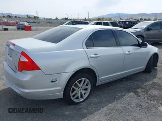 2010 Ford Fusion SEL with VIN 3FAHP0JA1AR327763, listed as a IAAI auction lot 41933656 with 90,517 mi miles. Bid and sale history available at carsss.com. Image 4.
