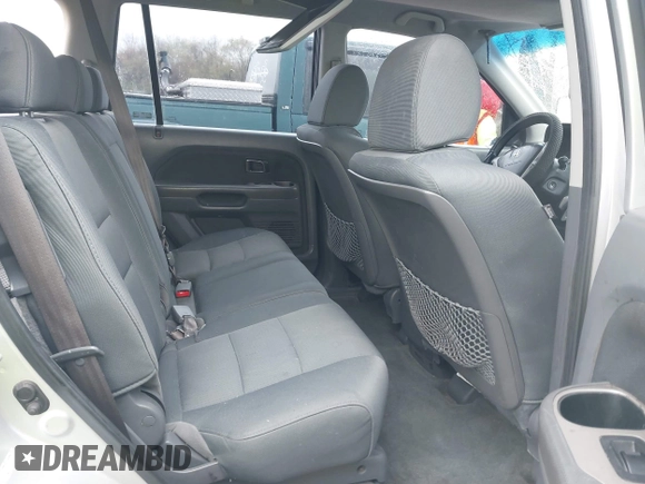 2007 Honda Pilot LX with VIN 2HKYF18157H530370, listed as a IAAI auction lot 41967033 with 214,590 mi miles and . Bid and sale history available at DreamBid. Image 8.