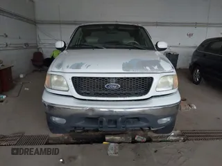 2003 Ford F-150 XLT with VIN 1FTRW08L03KB51627, listed as a IAAI auction lot 42497227 with 330,207 mi miles and . Bid and sale history available at DreamBid. Image 12.