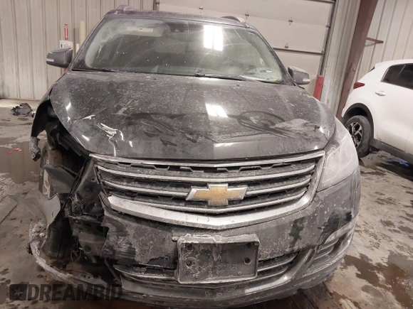 2015 Chevrolet Traverse LTZ with VIN 1GNKVJKD8FJ360899, listed as a IAAI auction lot 41634924 with 165,835 mi miles and . Bid and sale history available at DreamBid. Image 12.
