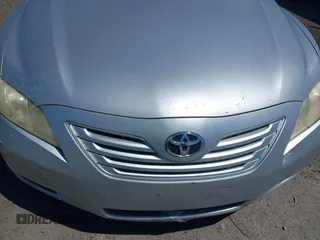 2007 Toyota Camry CE with VIN JTNBE46K173119853, listed as a IAAI auction lot 42133844 with 243,587 mi miles and . Bid and sale history available at DreamBid. Image 6.