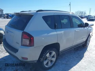 2014 Jeep Compass Latitude with VIN 1C4NJCEB1ED560365, listed as a IAAI auction lot 41348657 with 108,931 mi miles. Bid and sale history available at carsss.com. Image 4.