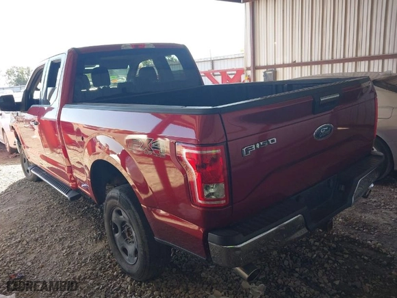 2015 Ford F-150 XLT with VIN 1FTFX1EF7FFA94960, listed as a IAAI auction lot 40268057 with 143,717 mi miles. Bid and sale history available at carsss.com. Image 3.