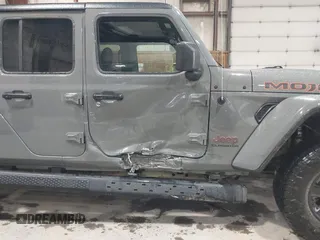 2021 Jeep Gladiator Mojave z VIN 1C6JJTEG5ML524829, wystawiony jako IAAI lot #42247982 z przebiegiem 20 158 mil mil oraz . Historia ofert i sprzedaży dostępna na DreamBid. Obrazek 6.