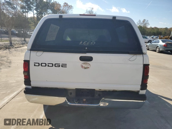 2001 Dodge 1500 z VIN 1B7HC16Y61S757908, wystawiony jako Copart lot #83604774 z przebiegiem 214 329 mil mil oraz Szkoda całkowita • Salvage title. Historia ofert i sprzedaży dostępna na DreamBid. Obrazek 6.
