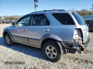 2005 Kia Sorento LX with VIN KNDJD733355371302, listed as a Copart auction lot 86979004 with 140,905 mi miles and Salvage Title. Bid and sale history available at carsss.com. Image 2.