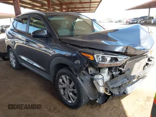 2021 Hyundai Tucson Value with VIN KM8J33A44MU403018, listed as a IAAI auction lot 42074597 with 63,654 mi miles and . Bid and sale history available at DreamBid. Image 1.