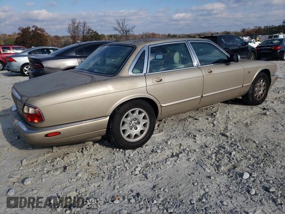 1998 Jaguar XJ with VIN SAJHX1242WC845736, listed as a Copart auction lot 82006044 with 188,785 mi miles and Salvage title. Bid and sale history available at DreamBid. Image 3.