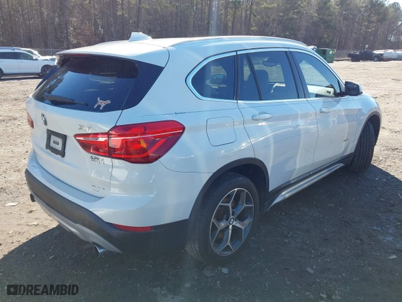 2017 BMW X1 xDrive28i with VIN WBXHT3C37H5F69725, listed as a IAAI auction lot 41588095 with 109,704 mi miles. Bid and sale history available at carsss.com. Image 4.