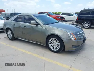 2010 Cadillac CTS Luxury with VIN 1G6DG5EG6A0148433, listed as a IAAI auction lot 42686517 with 106,701 mi miles and . Bid and sale history available at DreamBid. Image 1.