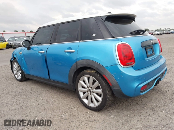 2017 MINI Hardtop 4 Door Cooper S z VIN WMWXU3C37H2F48944, wystawiony jako IAAI lot #41732140 z przebiegiem 154 563 mil mil oraz . Historia ofert i sprzedaży dostępna na DreamBid. Obrazek 3.