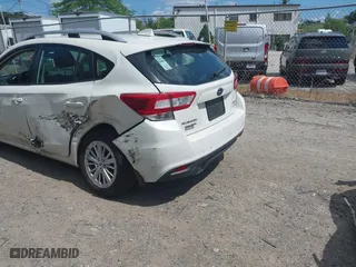 2017 Subaru Impreza Premium with VIN 4S3GTAD67H3748698, listed as a IAAI auction lot 39917558 with 56,945 mi miles. Bid and sale history available at carsss.com. Image 3.