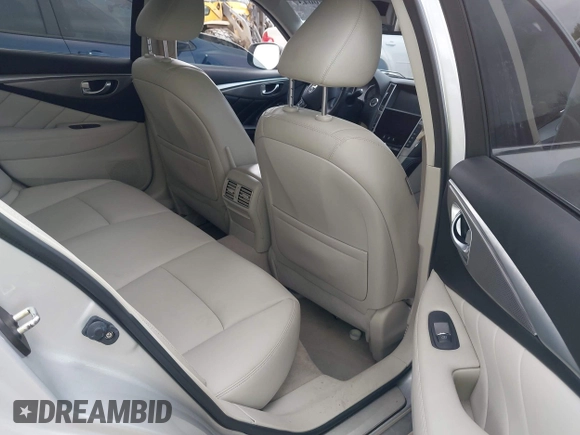 2015 Infiniti Q50 Premium z VIN JN1BV7AR8FM390785, wystawiony jako IAAI lot #42200437 z przebiegiem 94 841 mil mil oraz . Historia ofert i sprzedaży dostępna na DreamBid. Obrazek 8.