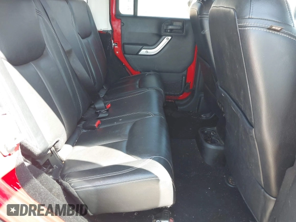 2015 Jeep Wrangler Unlimited Rubicon Hard Rock with VIN 1C4HJWFG9FL525556, listed as a IAAI auction lot 41973576 with 246,949 mi miles and . Bid and sale history available at DreamBid. Image 8.