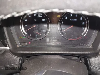 2020 BMW X1 xDrive28i z VIN WBXJG9C07L5P71792, wystawiony jako IAAI lot #41583132 z przebiegiem 150 095 mil mil oraz . Historia ofert i sprzedaży dostępna na DreamBid. Obrazek 7.