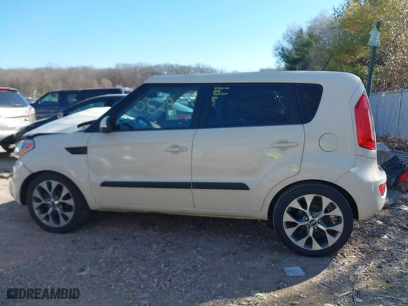 2012 Kia Soul + with VIN KNDJT2A62C7393781, listed as a IAAI auction lot 41818028 with 140,911 mi miles. Bid and sale history available at carsss.com. Image 14.
