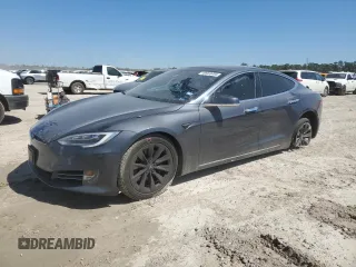 2017 Tesla Model S 100D z VIN 5YJSA1E20HF194600, wystawiony jako Copart lot #49068495 z przebiegiem 52 023 mil mil oraz Szkoda całkowita • Salvage title. Historia ofert i sprzedaży dostępna na DreamBid. Obrazek 1.