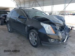2012 Cadillac SRX Premium Collection z VIN 3GYFNCE39CS548523, wystawiony jako IAAI lot #41854695 z przebiegiem 145 311 mil mil oraz . Historia ofert i sprzedaży dostępna na DreamBid. Obrazek 1.