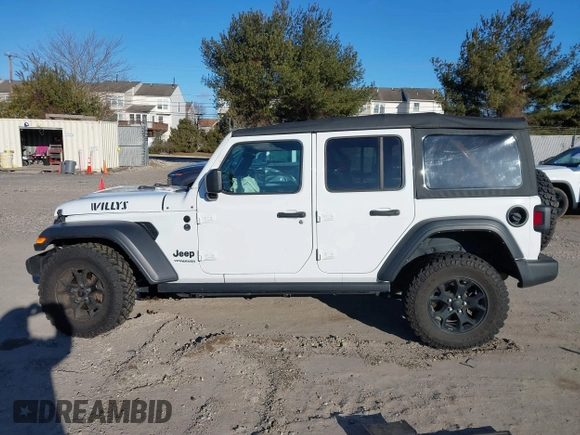 2021 Jeep Wrangler Unlimited Sport S with VIN 1C4HJXDG5MW697149, listed as a IAAI auction lot 41642386 with 71,253 mi miles. Bid and sale history available at carsss.com. Image 14.