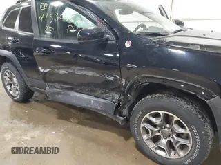 2022 Jeep Cherokee Trailhawk with VIN 1C4PJMBX8ND517236, listed as a IAAI auction lot 41530369 with 34,164 mi miles and . Bid and sale history available at DreamBid. Image 6.