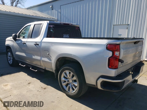 2021 Chevrolet Silverado 1500 Custom with VIN 1GCRWBEK0MZ188967, listed as a Copart auction lot 87637995 with 104,744 mi miles and Salvage Title. Bid and sale history available at DreamBid. Image 2.
