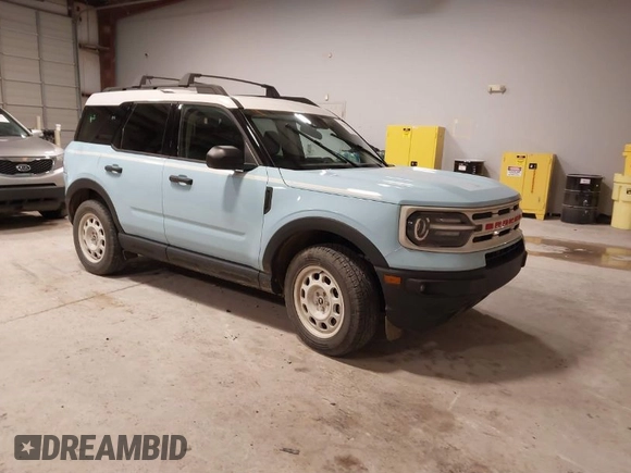 2023 Ford Bronco Sport Heritage z VIN 3FMCR9G63PRD69460, wystawiony jako IAAI lot #41588444 z przebiegiem 29 761 mil mil oraz . Historia ofert i sprzedaży dostępna na DreamBid. Obrazek 1.