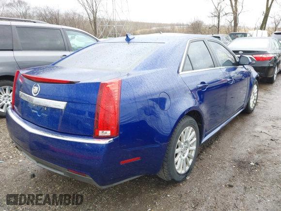 2012 Cadillac CTS with VIN 1G6DC5E59C0121787, listed as a IAAI auction lot 41718450 with 131,568 mi miles and . Bid and sale history available at DreamBid. Image 4.