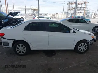 2011 Toyota Corolla L with VIN JTDBU4EE9B9131113, listed as a IAAI auction lot 42028423 with 191,157 mi miles. Bid and sale history available at carsss.com. Image 14.