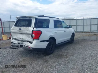 2024 Ford Expedition XLT with VIN 1FMJU1H87REA59678, listed as a IAAI auction lot 42253943 with 20,409 mi miles and . Bid and sale history available at DreamBid. Image 4.