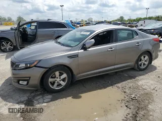 2015 Kia Optima LX z VIN 5XXGM4A79FG487356, wystawiony jako Copart lot #55650485 z przebiegiem 82 010 mil mil oraz Szkoda całkowita • Salvage title. Historia ofert i sprzedaży dostępna na DreamBid. Obrazek 1.