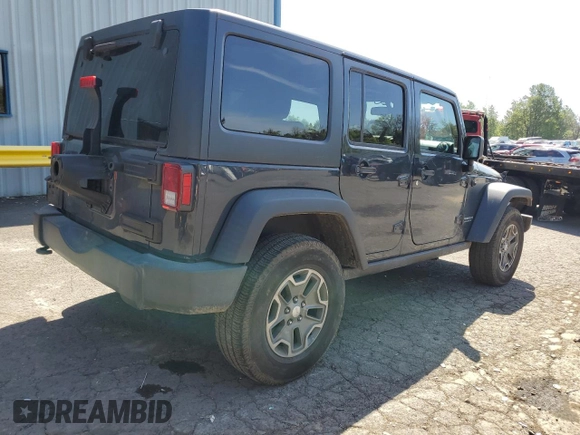 2017 Jeep Wrangler Unlimited Rubicon z VIN 1C4BJWFG6HL724069, wystawiony jako Copart lot #55773055 z przebiegiem 64 515 mil mil oraz Szkoda całkowita • Salvage title. Historia ofert i sprzedaży dostępna na DreamBid. Obrazek 3.