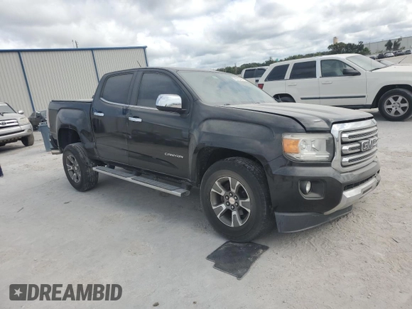 2015 GMC Canyon 2WD SLT with VIN 1GTG5CE31F1263234, listed as a Copart auction lot 76512794 with 113,180 mi miles and Salvage Title. Bid and sale history available at carsss.com. Image 4.