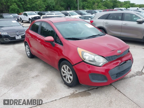 2015 Kia Rio LX with VIN KNADM5A34F6517123, listed as a IAAI auction lot 42125593 with 138,214 mi miles. Bid and sale history available at carsss.com. Image 1.