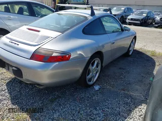 1999 Porsche 911 with VIN WP0AA2991XS623852, listed as a IAAI auction lot 42207441 with 100,548 mi miles and . Bid and sale history available at DreamBid. Image 4.