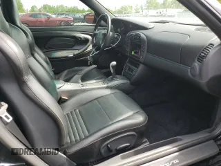1999 Porsche 911 z VIN WP0AA2990XS626600, wystawiony jako Copart lot #56749505 z przebiegiem 82 979 mil mil oraz Szkody całkowita. Historia ofert i sprzedaży dostępna na DreamBid. Obrazek 12.