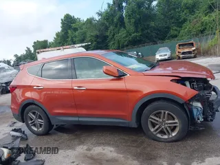 2017 Hyundai Santa Fe 2.4L z VIN 5XYZTDLB6HG451345, wystawiony jako IAAI lot #42665264 z przebiegiem 129 855 mil mil oraz . Historia ofert i sprzedaży dostępna na DreamBid. Obrazek 14.
